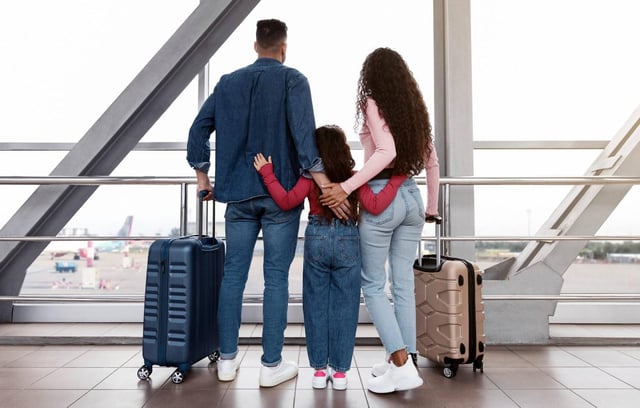 A Family Waiting At The Airport