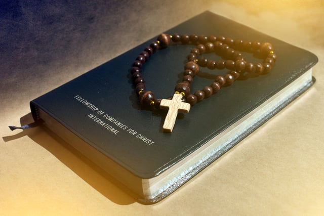 Bible With A Wooden Cross
