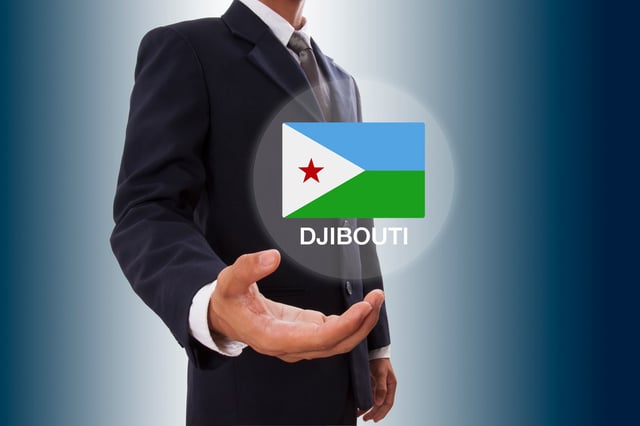 Businessman Hand Showing Djibouti Flag