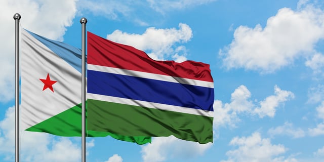 Djibouti And Gambia Flag Waving In The Wind Against White