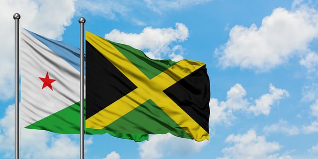 Djibouti And Jamaica Flag Waving In The Wind
