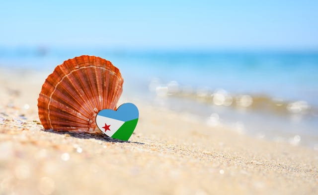 Djibouti Flag In The Shape Of A Heart And A Large Shell