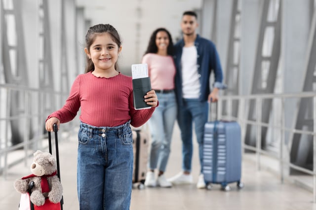 Family Prepares For Travel At The Airport