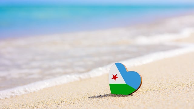 Flag Of Djibouti In The Shape Of A Heart On A Sandy Beach Flag Of Djibouti In The Shape Of A Heart On A Sandy Beach