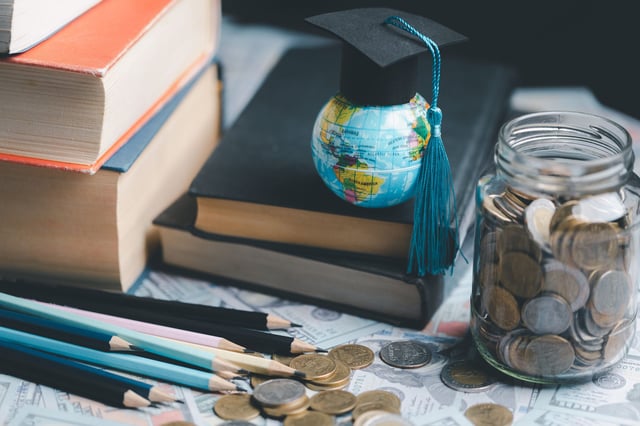 Graduation Cap On Globe