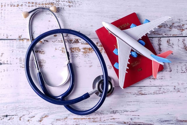 Stethoscope, Passport, and Toy Airplane