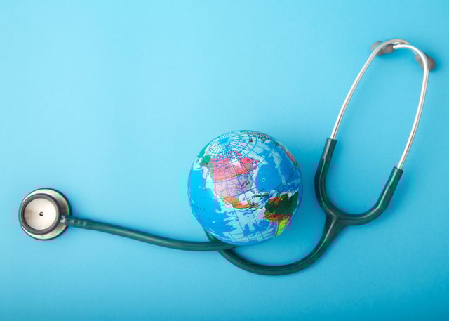 Stethoscope Wrapped Around Globe