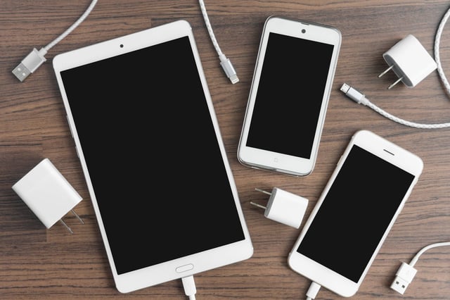 Tablets and phones with charging cables