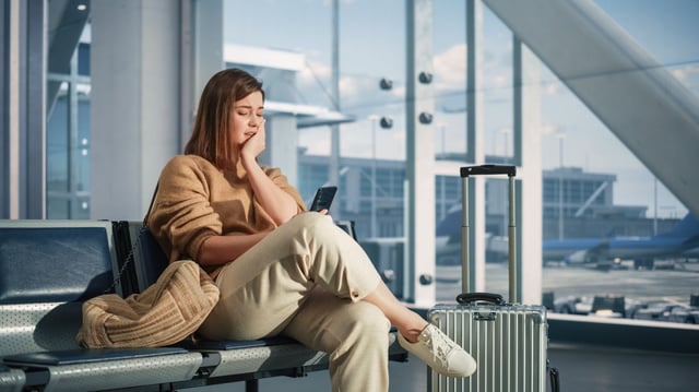 Traveller Waiting During Airport Layover