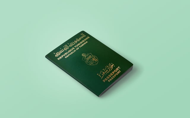Tunisian Passport On The Top Of An Wood Background