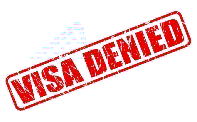 Visa Denied Text Stamped On A Plain White Background