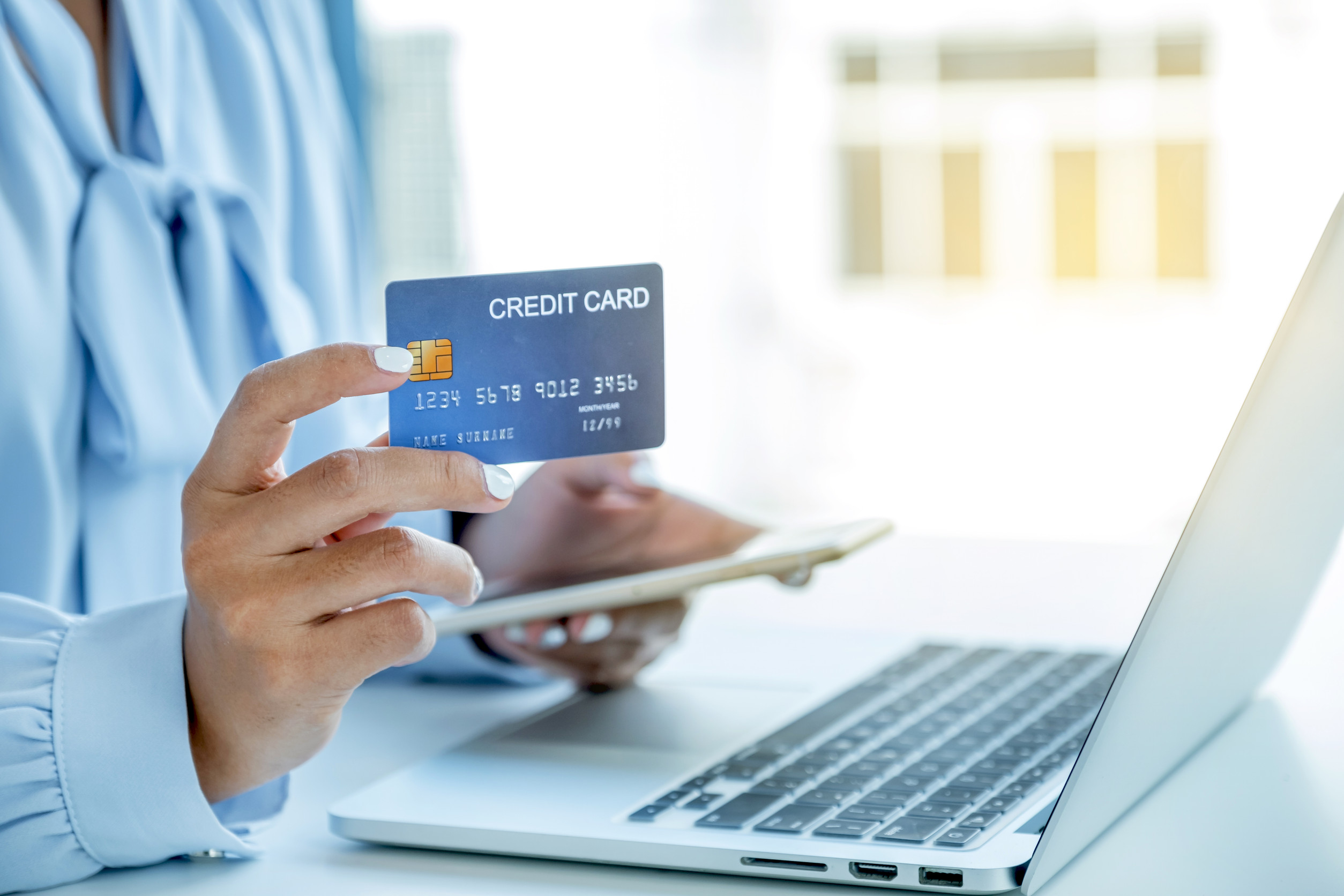 Consumer Woman Hand Holding A Mock Up Credit Card Ready To Spending Pay Online