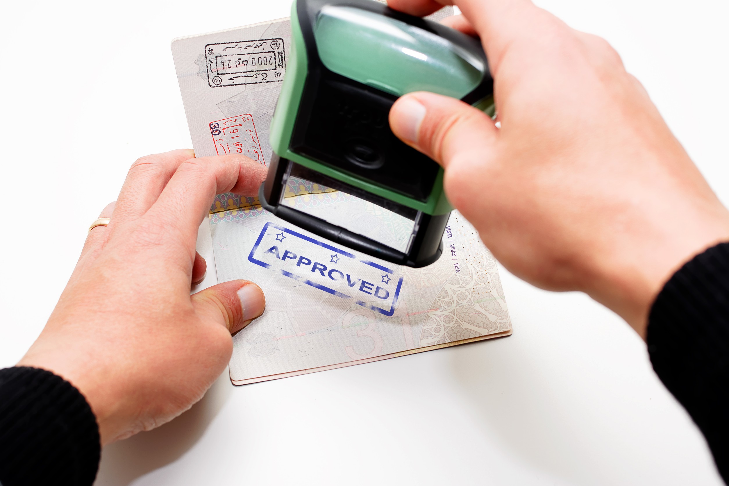Stamping Passport With Blue Stamp Approved
